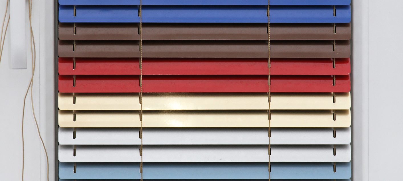 multi coloured vertical blinds in the colours of the rainbow