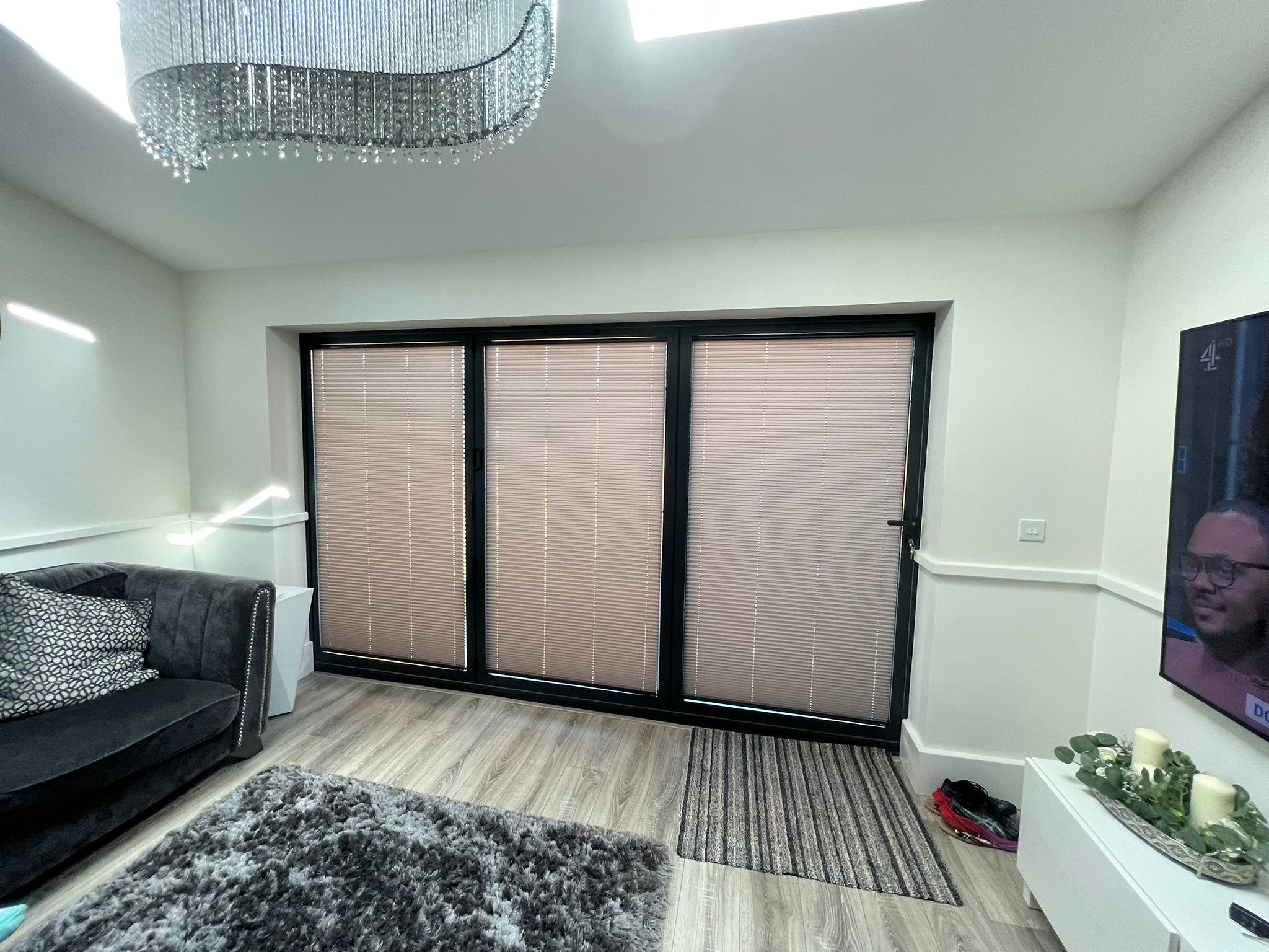 pleated blinds on bi-fold doors in lounge